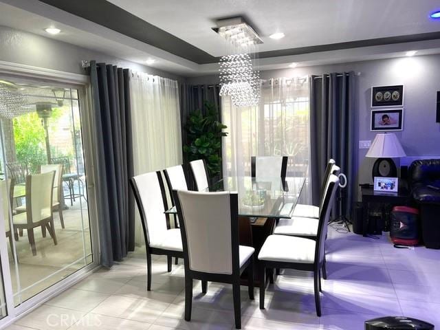 2163 N Justin Ave N, Simi Valley, CA 93065 - dining space featuring a chandelier and light tile patterned floors