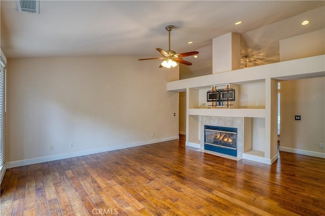 635 Shelter Ridge Pl, Nipomo, CA 93444 - unfurnished living room with lofted ceiling, a fireplace, wood finished floors, ceiling fan, and recessed lighting