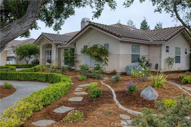 635 Shelter Ridge Pl, Nipomo, CA 93444 - mediterranean / spanish-style home featuring a tile roof, a chimney, and stucco siding