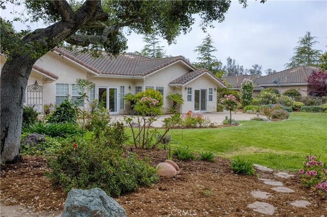 635 Shelter Ridge Pl, Nipomo, CA 93444 - view of front of property featuring a tile roof, stucco siding, and a front yard
