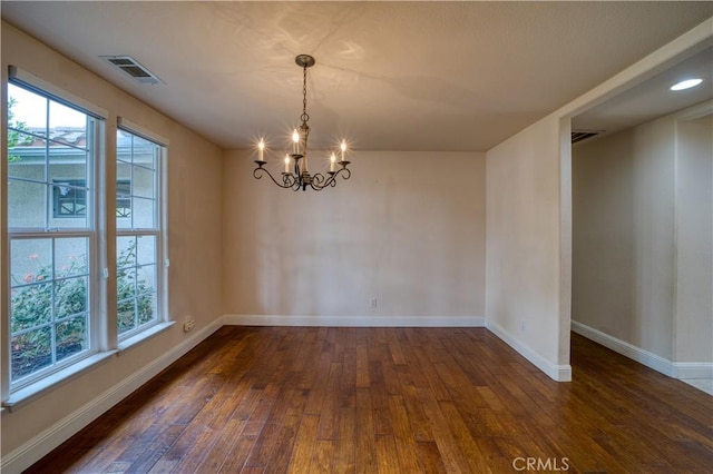 635 Shelter Ridge Pl, Nipomo, CA 93444 - unfurnished room featuring a chandelier, dark wood-style flooring, and plenty of natural light