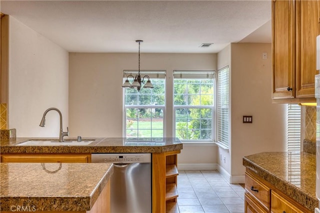 635 Shelter Ridge Pl, Nipomo, CA 93444 - kitchen with stainless steel dishwasher, tile countertops, brown cabinetry, light tile patterned floors, and a peninsula