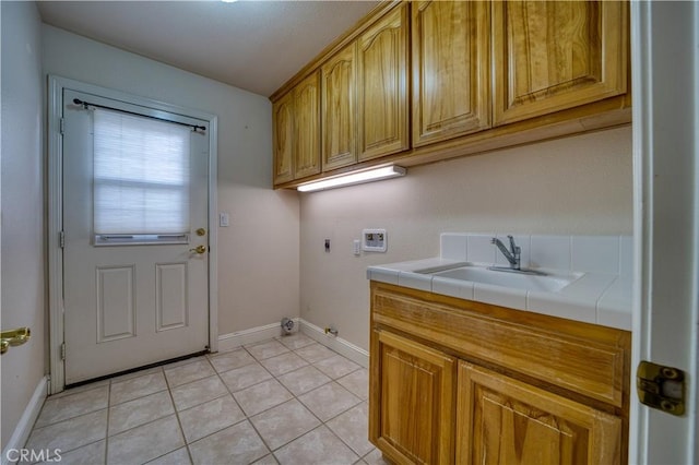 635 Shelter Ridge Pl, Nipomo, CA 93444 - washroom featuring washer hookup, cabinet space, gas dryer hookup, light tile patterned floors, and electric dryer hookup