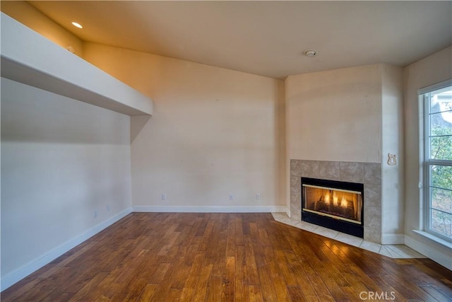 635 Shelter Ridge Pl, Nipomo, CA 93444 - unfurnished living room featuring hardwood / wood-style flooring, a fireplace, and recessed lighting