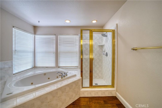 635 Shelter Ridge Pl, Nipomo, CA 93444 - bathroom with a tub with jets, a stall shower, and wood finished floors