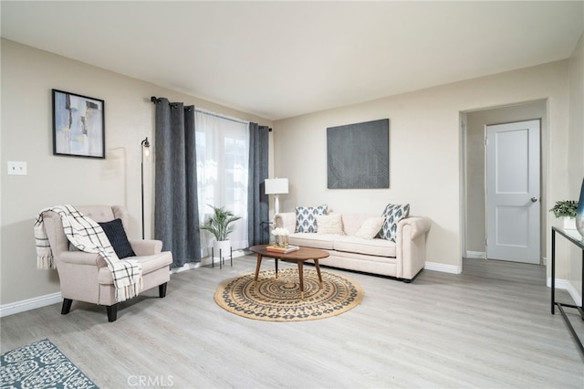 1963 Turrill Ave, San Bernardino, CA 92411 - living room with light wood finished floors and baseboards