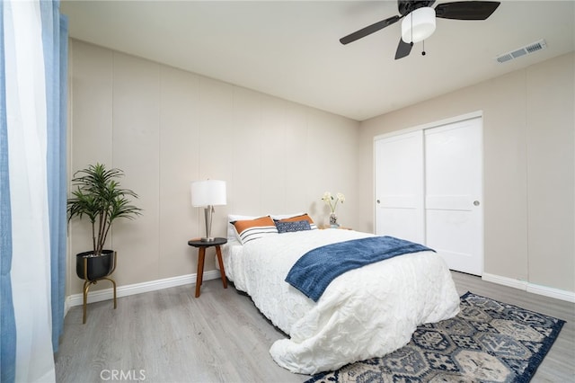 1963 Turrill Ave, San Bernardino, CA 92411 - bedroom featuring light wood-style flooring, baseboards, a ceiling fan, and a closet