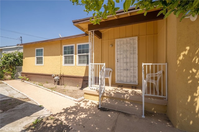 1963 Turrill Ave, San Bernardino, CA 92411 - entrance to property with board and batten siding