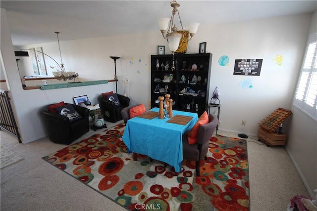 4041 Bluff Pl Unit 2, San Pedro, CA 90731 - carpeted living room featuring a chandelier, radiator, and baseboards