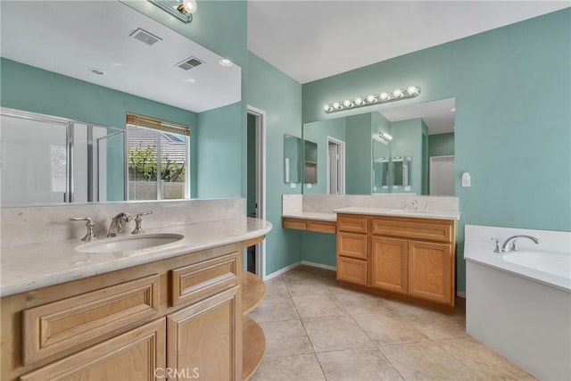 197 Potter Crk, Beaumont, CA 92223 - full bathroom featuring two vanities, a garden tub, tile patterned flooring, and a shower stall