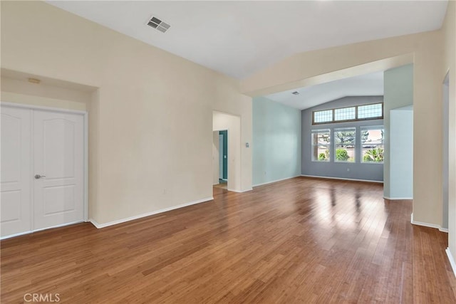 197 Potter Crk, Beaumont, CA 92223 - empty room featuring vaulted ceiling, light wood-style floors, and baseboards