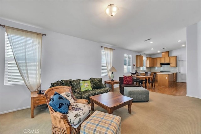197 Potter Crk, Beaumont, CA 92223 - living area featuring light carpet, baseboards, recessed lighting, and vaulted ceiling