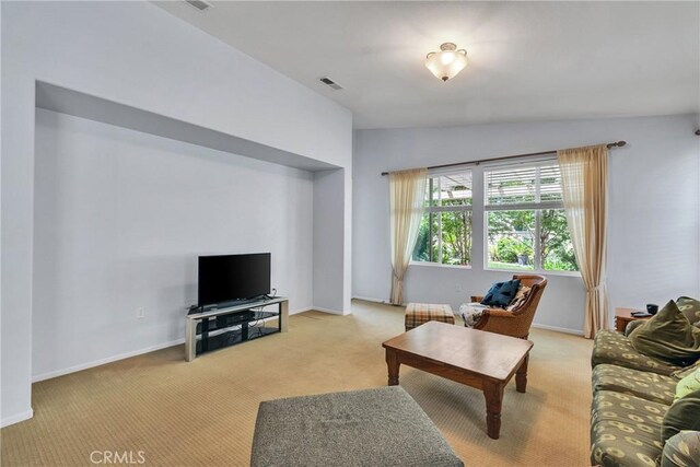 197 Potter Crk, Beaumont, CA 92223 - living room with light carpet, baseboards, and lofted ceiling