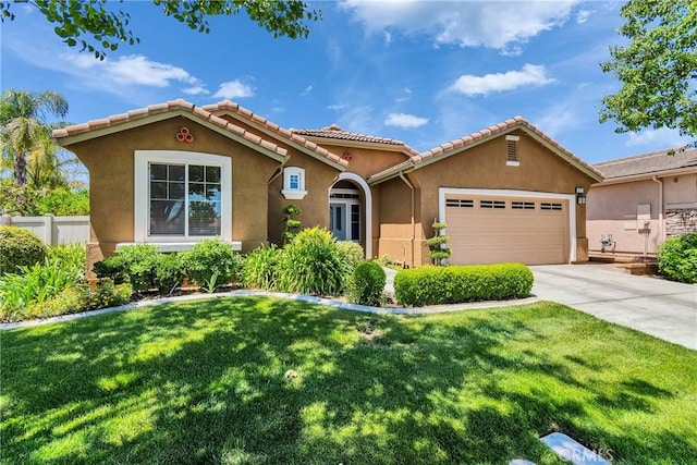 197 Potter Crk, Beaumont, CA 92223 - mediterranean / spanish house featuring stucco siding, an attached garage, a tiled roof, and concrete driveway