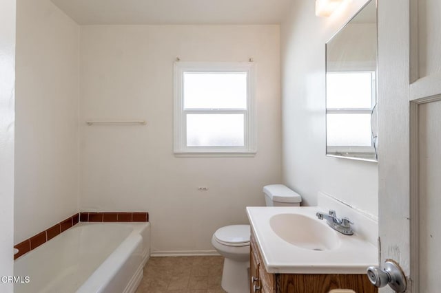 8528 Palma Vista St, San Gabriel, CA 91775 - bathroom featuring toilet, a tub to relax in, vanity, tile patterned flooring, and baseboards