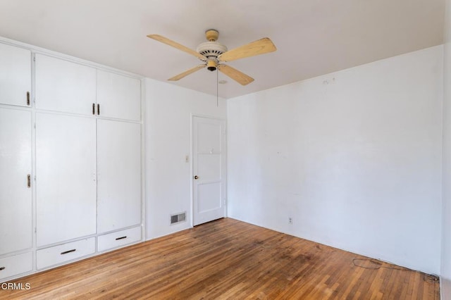 8528 Palma Vista St, San Gabriel, CA 91775 - unfurnished bedroom with wood finished floors, a closet, and a ceiling fan