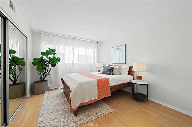 2500 Abbot Kinney Blvd Unit 9, Venice, CA 90291 - bedroom with light wood-style floors, a closet, and baseboards