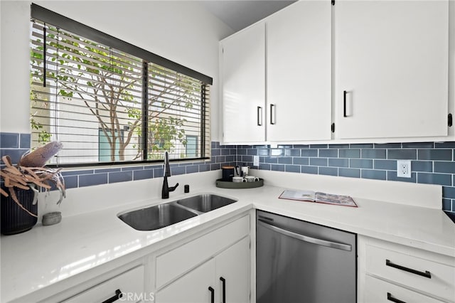 2500 Abbot Kinney Blvd Unit 9, Venice, CA 90291 - kitchen with stainless steel dishwasher, a sink, decorative backsplash, light countertops, and white cabinetry