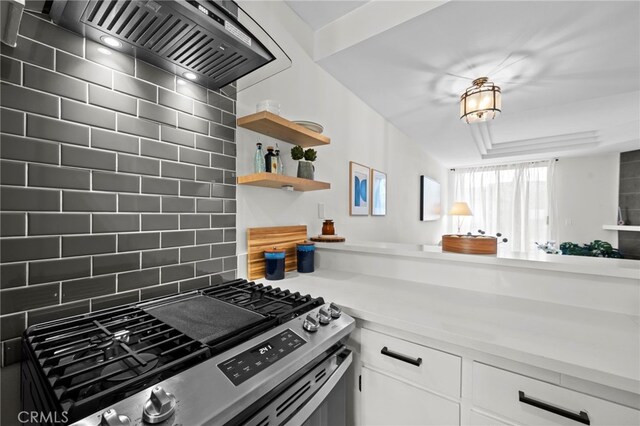 2500 Abbot Kinney Blvd Unit 9, Venice, CA 90291 - kitchen featuring gas stove, custom range hood, backsplash, light countertops, and white cabinets
