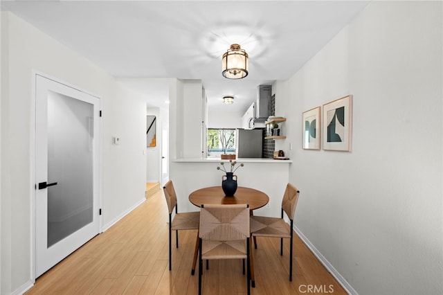 2500 Abbot Kinney Blvd Unit 9, Venice, CA 90291 - dining space featuring light wood finished floors and baseboards