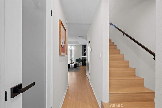 2500 Abbot Kinney Blvd Unit 9, Venice, CA 90291 - stairway featuring wood finished floors and baseboards