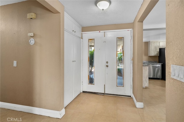 8631 Holly St, Rancho Cucamonga, CA 91701 - foyer entrance featuring baseboards and light tile patterned flooring