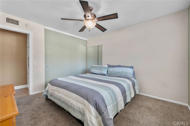 8631 Holly St, Rancho Cucamonga, CA 91701 - carpeted bedroom with baseboards and ceiling fan