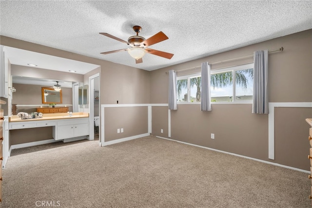 8631 Holly St, Rancho Cucamonga, CA 91701 - unfurnished bedroom featuring carpet, baseboards, ensuite bathroom, a textured ceiling, and a sink