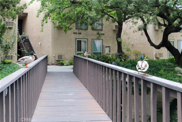 7890 E Spring St Unit 18D, Long Beach, CA 90815 - view of wooden balcony featuring a wooden deck