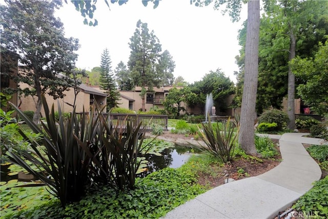7890 E Spring St Unit 18D, Long Beach, CA 90815 - view of property's community featuring a garden pond