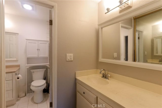 7890 E Spring St Unit 18D, Long Beach, CA 90815 - bathroom featuring vanity, toilet, and tile patterned flooring
