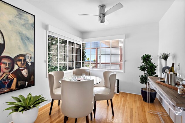 2142 Ruby Pl, Laguna Beach, CA 92651 - dining space featuring a ceiling fan, wood finished floors, and baseboards