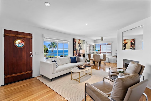 2142 Ruby Pl, Laguna Beach, CA 92651 - living room with healthy amount of natural light, light wood finished floors, ceiling fan, and recessed lighting