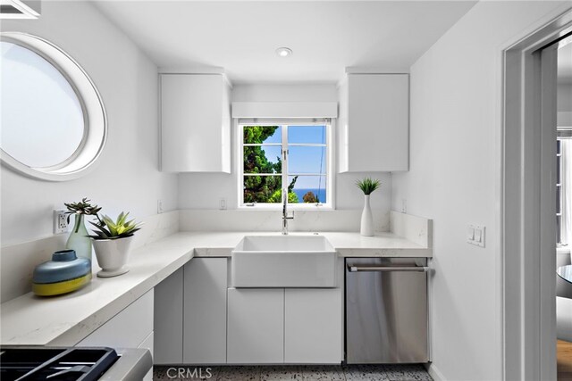 2142 Ruby Pl, Laguna Beach, CA 92651 - kitchen featuring dishwasher, a sink, light countertops, white cabinetry, and recessed lighting