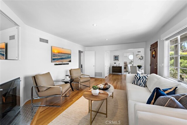 2142 Ruby Pl, Laguna Beach, CA 92651 - living area with wood finished floors, baseboards, and recessed lighting