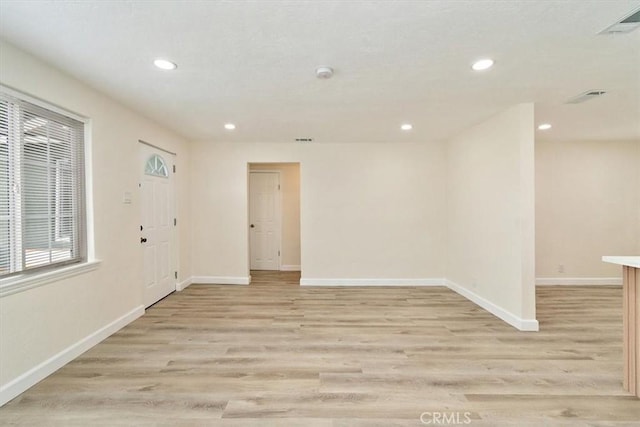 1988 Thornton St, Riverside, CA 92507 - empty room featuring light wood-style floors, recessed lighting, baseboards, and a smoke detector