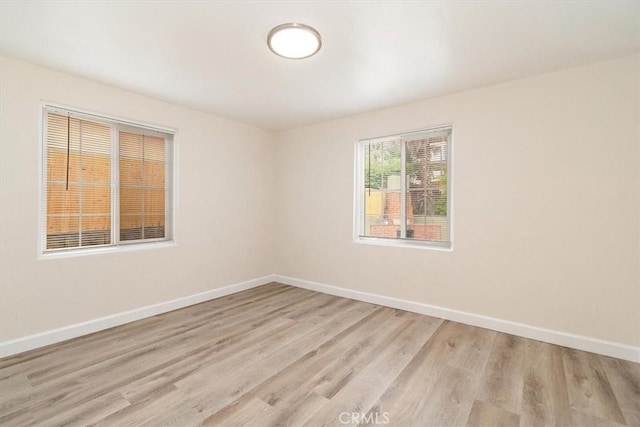 1988 Thornton St, Riverside, CA 92507 - unfurnished room with light wood-type flooring and baseboards