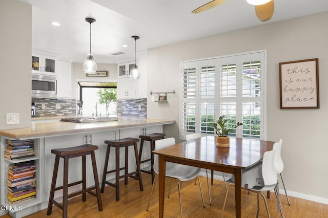 825 Murdoch Ln, Ventura, CA 93003 - dining space with wood finished floors, recessed lighting, ceiling fan, and baseboards