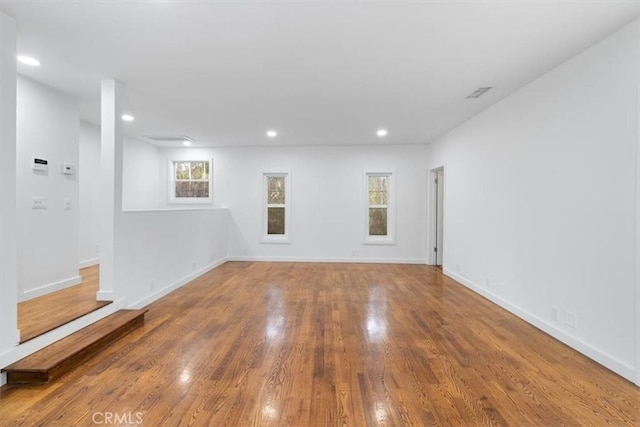 12535 Kling St, Studio City, CA 91604 - spare room featuring plenty of natural light, wood finished floors, recessed lighting, and baseboards
