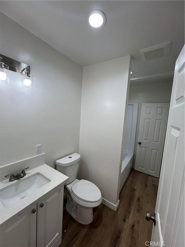 3065 Sastre Ave, El Monte, CA 91733 - full bathroom featuring wood finished floors, toilet, and vanity