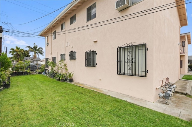 3065 Sastre Ave, El Monte, CA 91733 - view of side of home featuring a yard and stucco siding