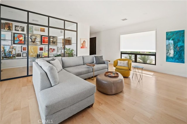 4756 Keniston Ave, Los Angeles, CA 90043 - living area featuring light wood-type flooring