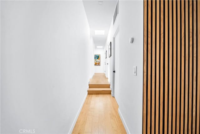 4756 Keniston Ave, View Park, CA 90043 - corridor with light wood-type flooring and baseboards