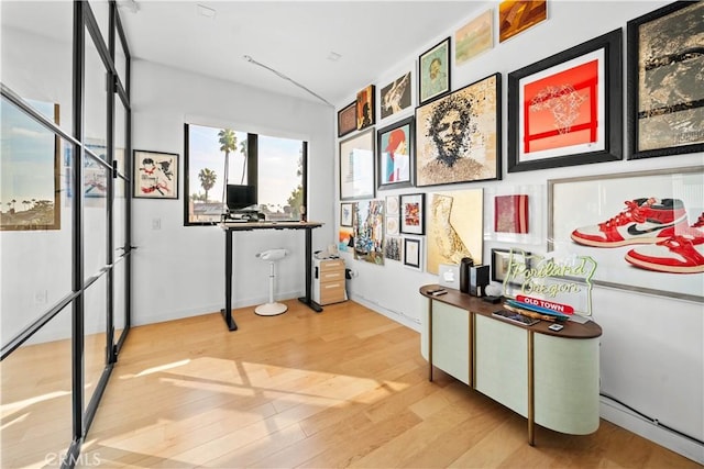 4756 Keniston Ave, View Park, CA 90043 - office featuring baseboard heating and wood finished floors