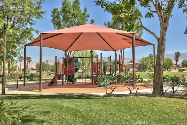 84692 Pavone Way, Indio, CA 92203 - communal playground featuring a mountain view and a yard