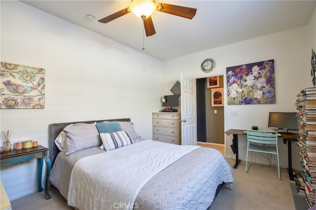 84692 Pavone Way, Indio, CA 92203 - bedroom featuring light carpet, a ceiling fan, and baseboards