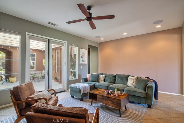 84692 Pavone Way, Indio, CA 92203 - living room with light tile patterned floors, a ceiling fan, recessed lighting, and baseboards