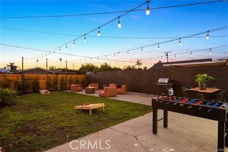 10290 Monte Vista Ave, Montclair, CA 91763 - yard at dusk featuring a patio