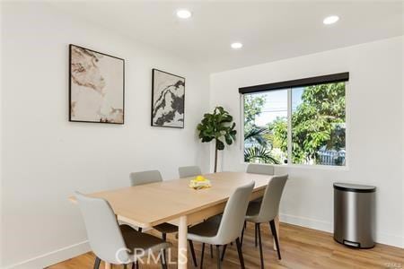 10290 Monte Vista Ave, Montclair, CA 91763 - dining space with baseboards, recessed lighting, and light wood finished floors