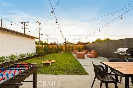 10290 Monte Vista Ave, Montclair, CA 91763 - view of yard with an outdoor hangout area, a patio area, and outdoor dining area